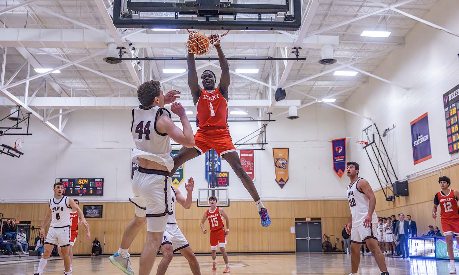 Dorian Paki ’27 dunks during the Hobart basketball game against Union. 