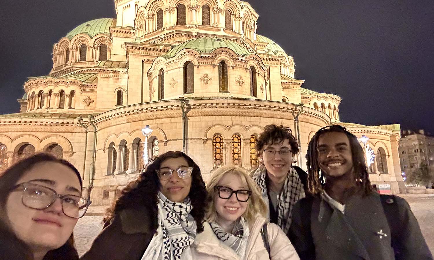 Joined by Presidential Fellow Sophia Mughal ’25, Hudson Chou ’27, Sasha Zory ’28, Briana Reyes ’28 and Dylan Ballard ’28 pose for a photo in Sofia, Bulgaria, where they competed in the World Universities Debating Championship.  