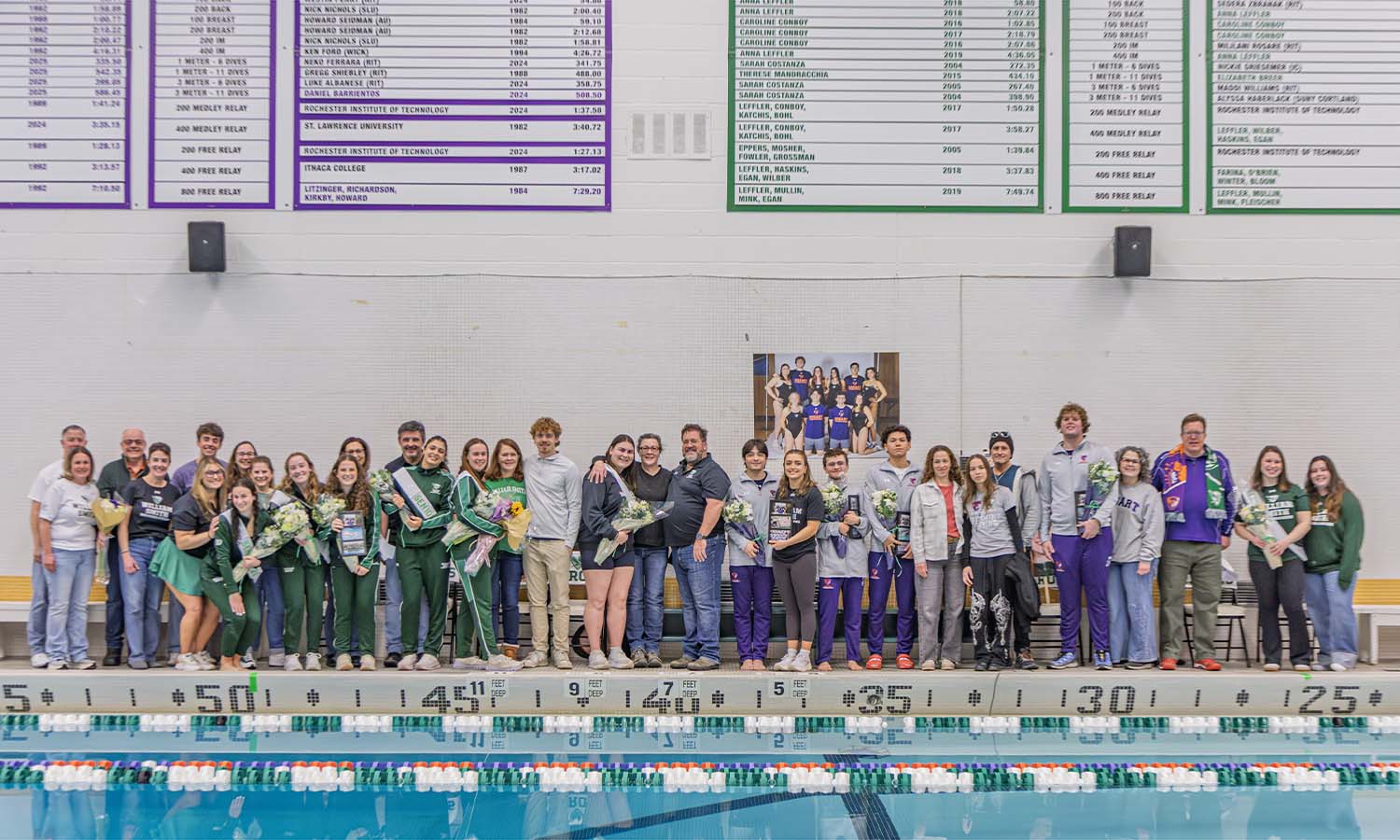 Seniors on the Hobart and William Smith swimming and diving teams pose for a photo with their families during their senior day celebration before their meet against&nbsp;RIT at Bristol Pool. &nbsp; 