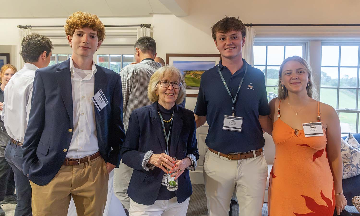 Mary Herlihy Gearan joins Brandon Chapman ’30, Tim O’Keefe ’30 and Kayla Harris ’30 for a photo at the HWS Summer Gathering on Cape Cod. The three will join HWS as first year students this fall. 