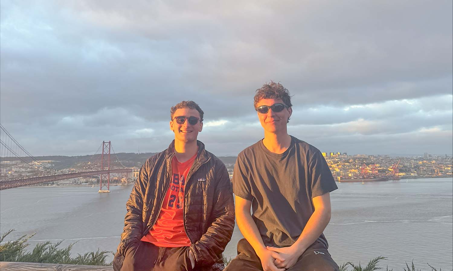 While studying abroad this semester, Colton Lestorti ’27 and James Akgonul ’27 pose for a photo at Santuário Nacional de Cristo Rei overlooking downtown Lisbon, Portugal. 