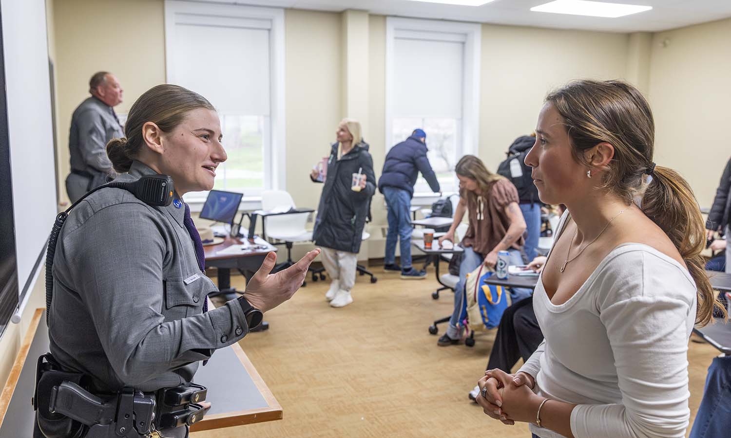 New York State trooper Emma Faso ’23, MSM ’24 speaks with Katie Ingle ’27 about her career path after graduation following the conclusion of “Sociology of Police and Policing” with Professor of Sociology Jim Sutton. 