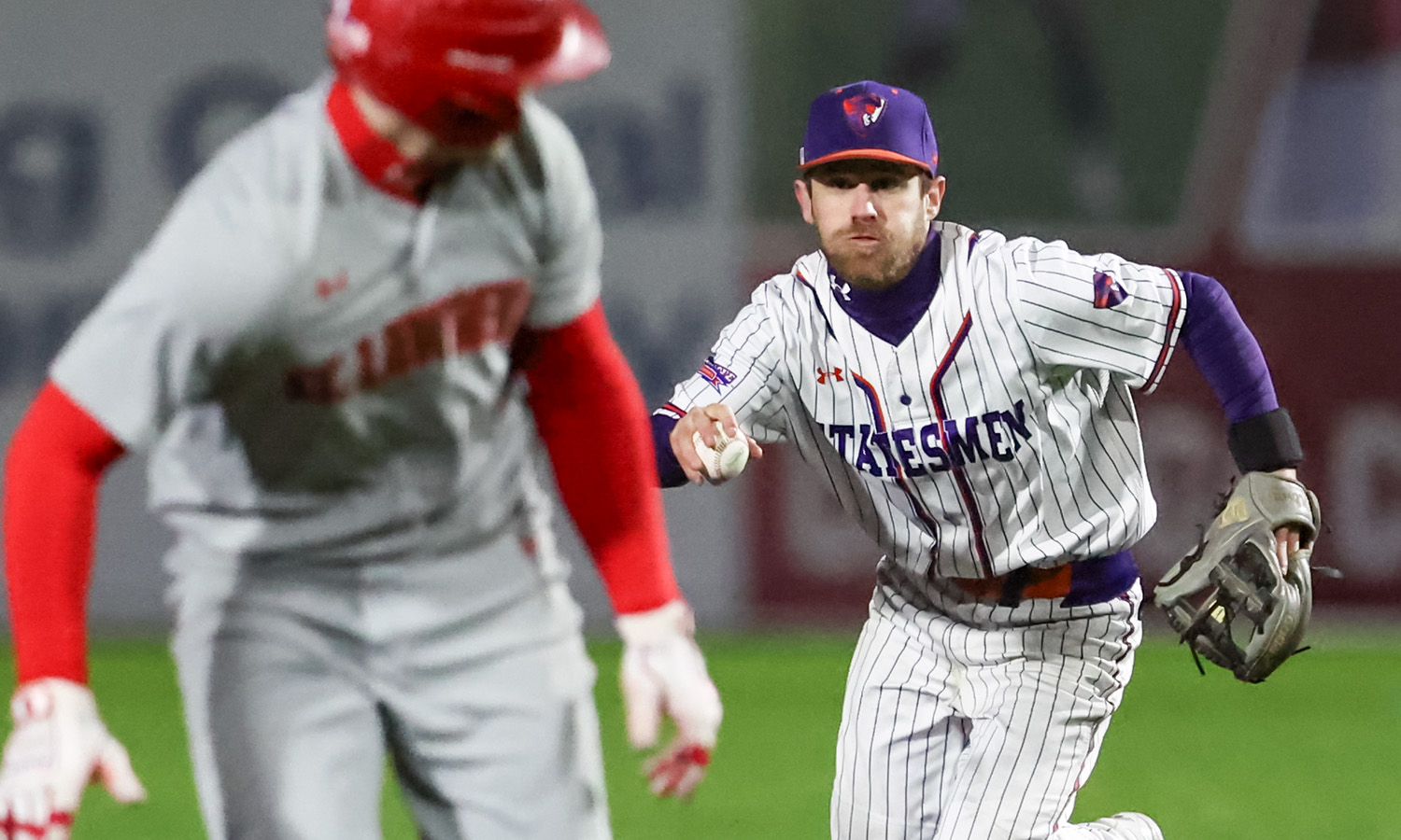 Christian Petry '26 runs down a St. Lawrence baserunner during Hobart baseball’s victory at Falcon Park. 