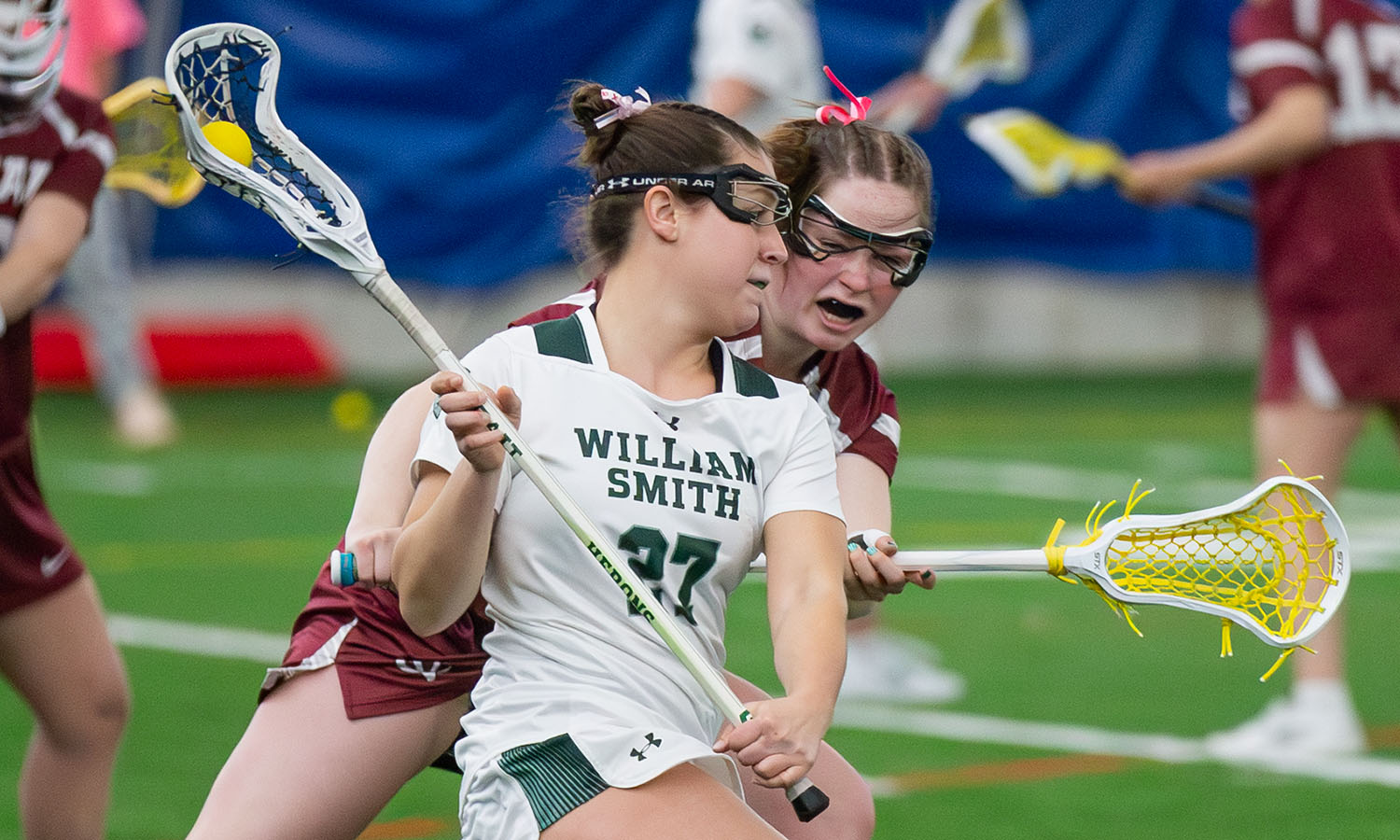 Taryn Luzi '26 evades a defender during the Herons 19-6 victory over Vassar. Luzi scored 6 goals in the game. 