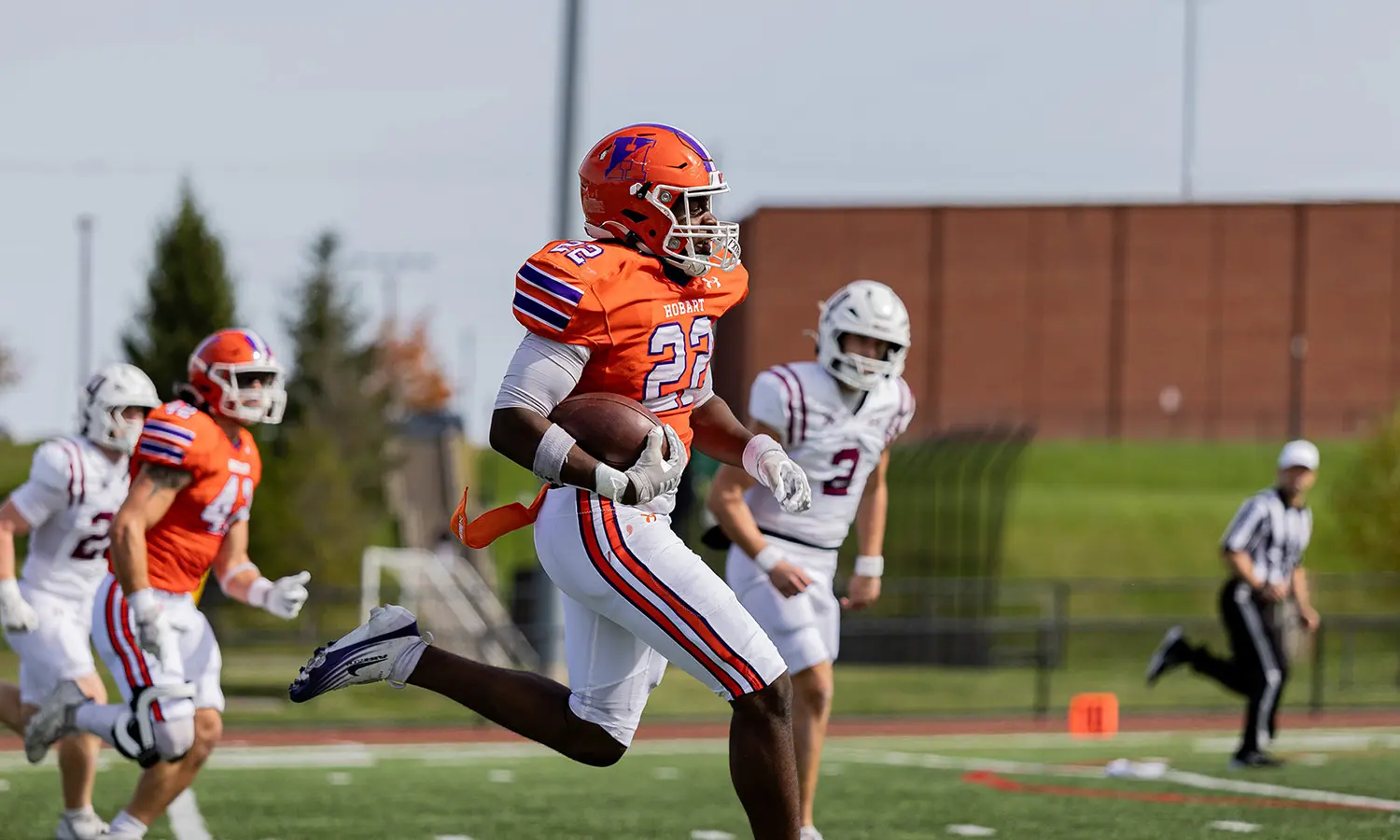 MJ Wells '30 returns an interception for a touchdown during Hobart Football's 18-12 victory over Union. 