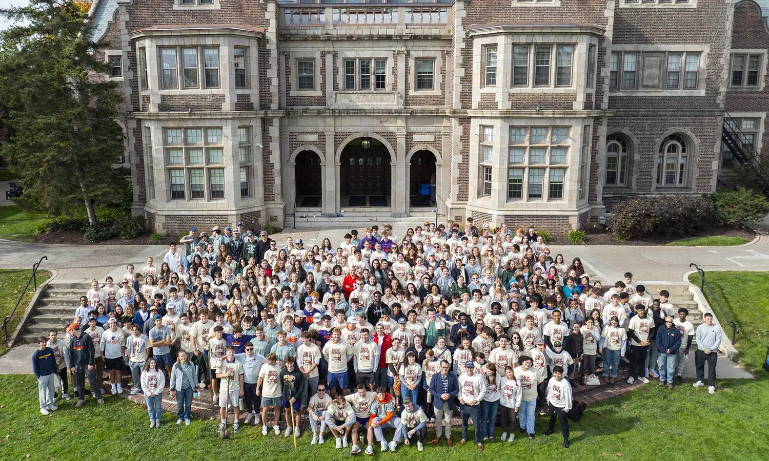 Students gather on the steps of Coxe Hall before volunteering across Geneva and the Finger Lakes for Day of Service. 