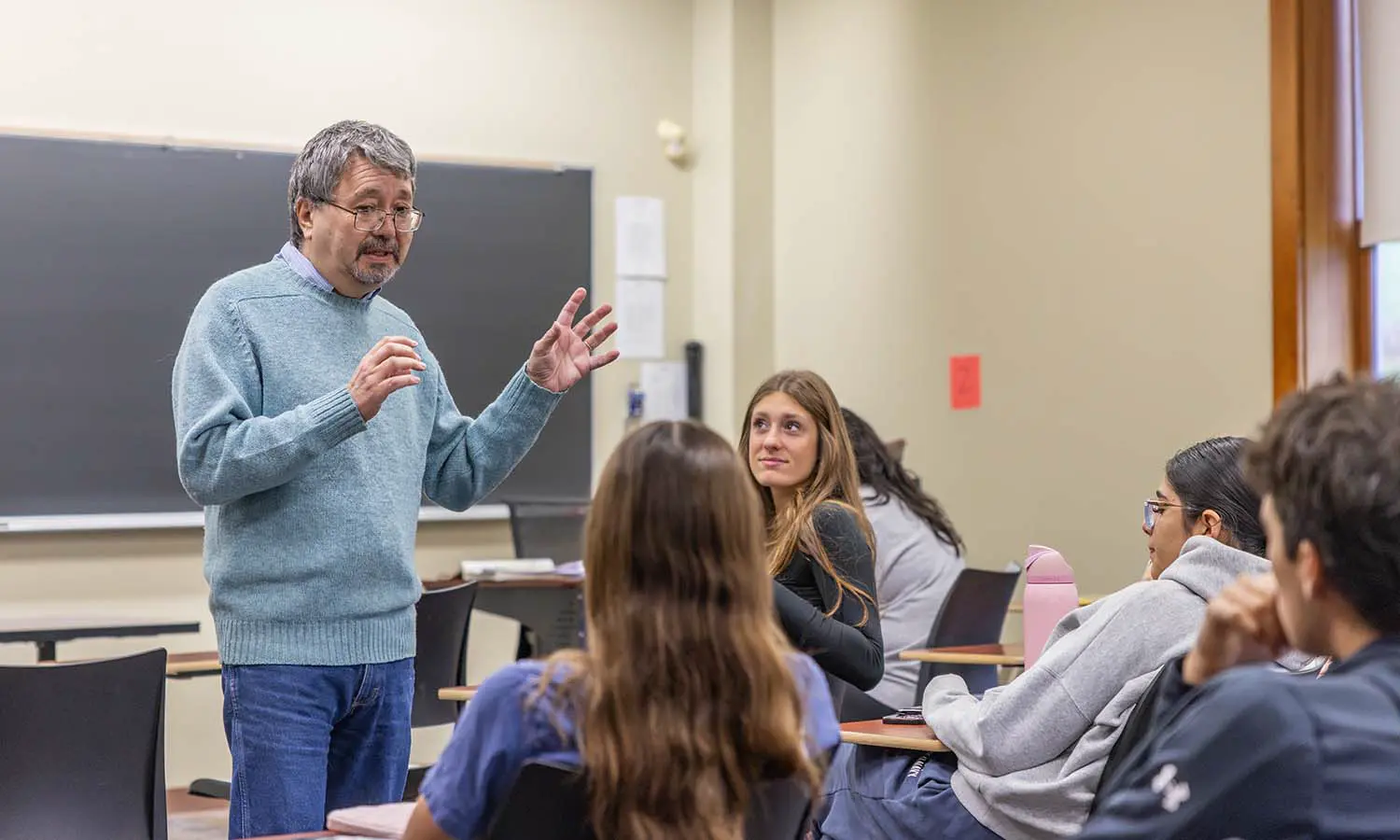 Sebastiano Lucci, who leads HWS’ program in languages and is an instructor of Italian, reviews the vocabulary for describing a family tree during “Beginning Italian.”  