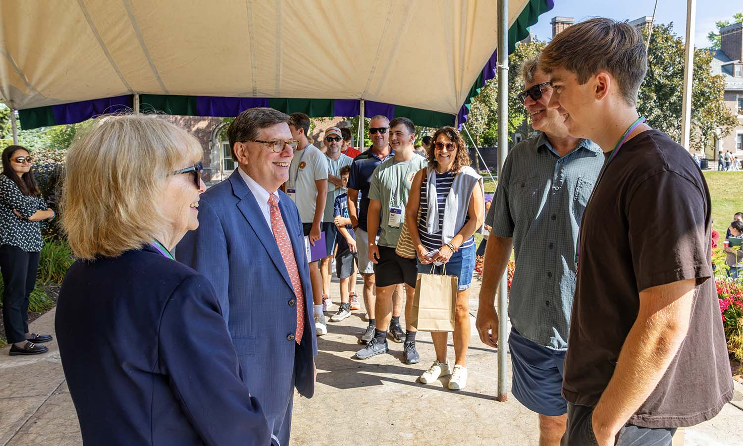 Cal Hackett ’30 of Gilbertsville, Pa. is greeted by President Mark D. Gearan and Mary Herlihy Gearan. 
