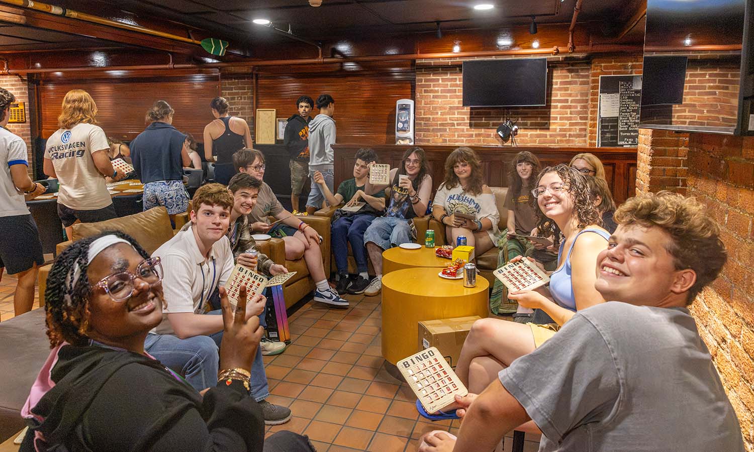 First-years pose for a photo while playing bingo in the Cellar Pub. 