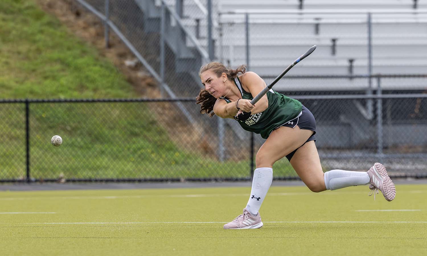 Eliza Freeland ’28 fires a shot on goal during a William Smith field hockey preseason practice. 