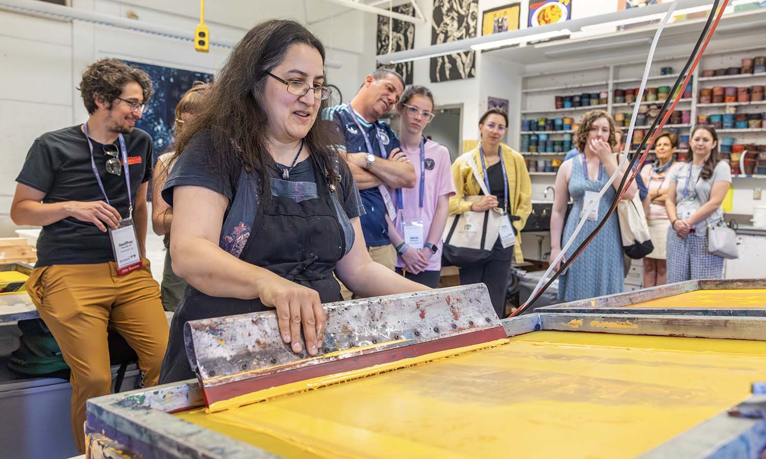 Professor of Art and Architecture Christine Chin leads alumni in a demonstration during a mini-class on cyanotypes and silkscreens held in the Katherine D. Elliot Studio Arts Center. 