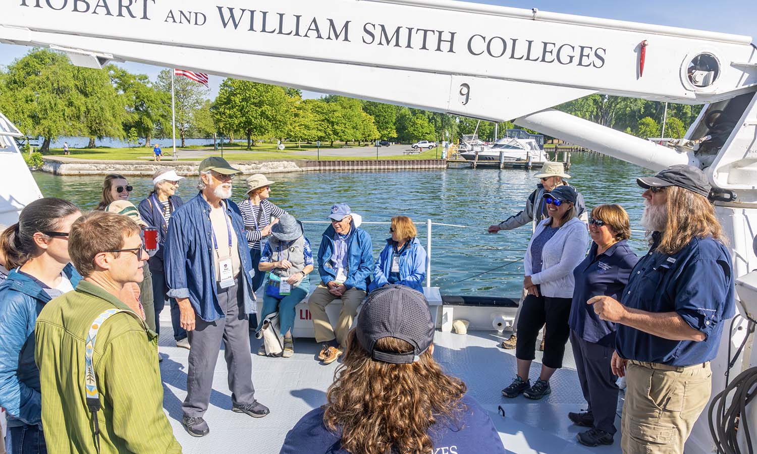 Captain Dave Rockwell (right) discusses the travel route of the William Scandling research vessel before exploring  Seneca Lake. The tour was led by Dr. Lisa Cleckner, director of the Finger Lakes Institute. 