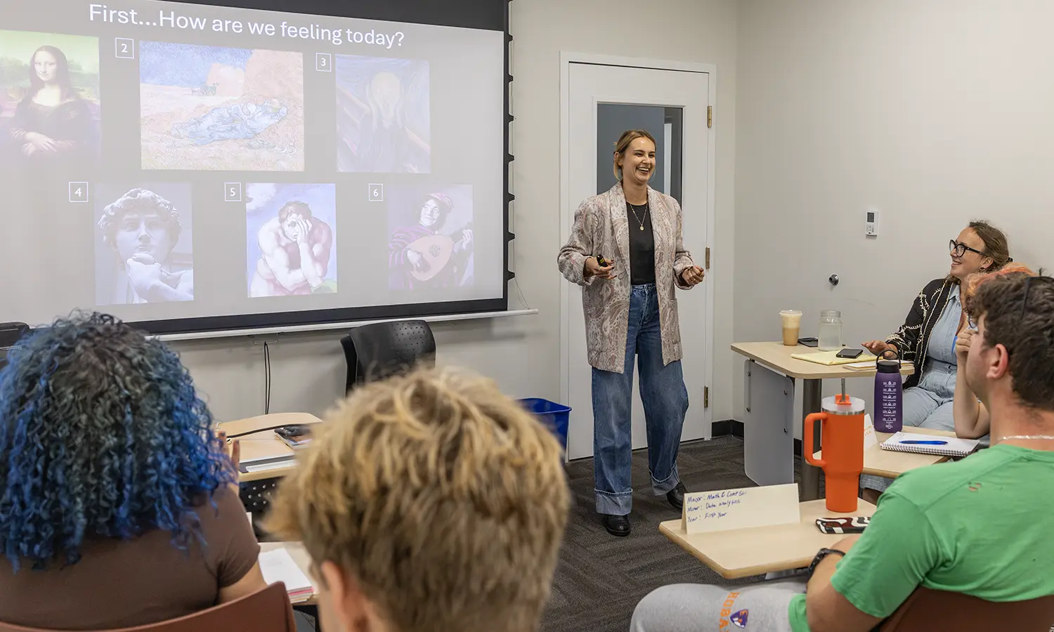 Caitlin Petty ’16, an art historian and doctoral researcher at Washington University in St. Louis, presents during “The Art of Resistance” co-taught by Assistant Professor of Religious Studies Blaize Gervais and Associate Professor of Art and Architecture Angelique Szymanek. 