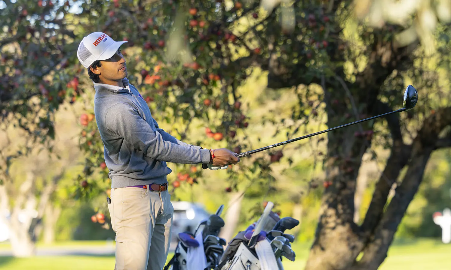 Aman Dhiman '29 tees off during a practice round at the Clifton Springs Country Club. 