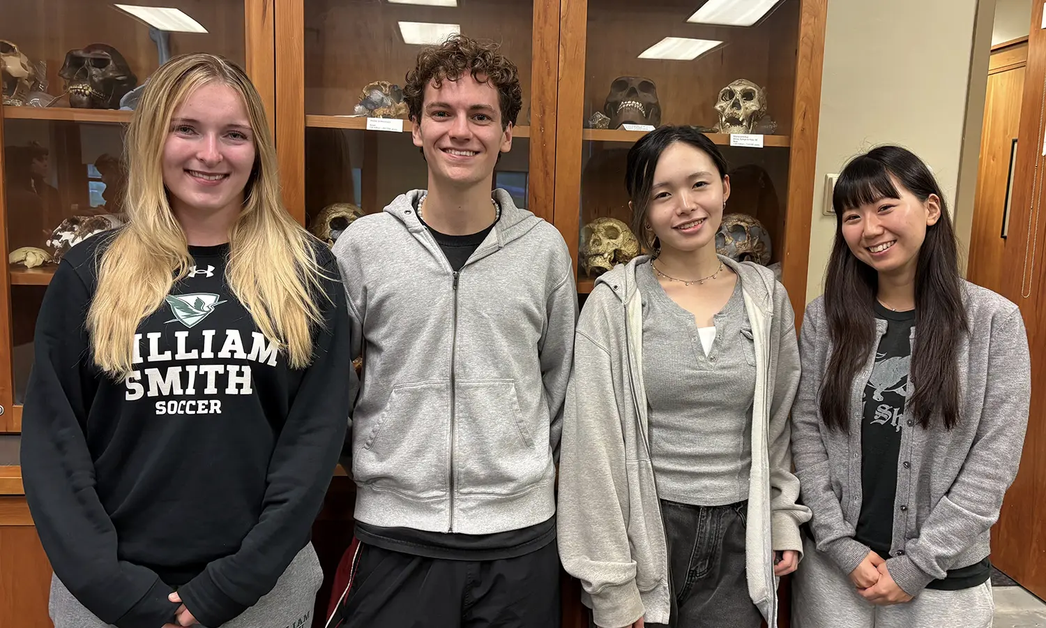 Caroline Lyddane '28, Roland Gardner-Olesen '29, Miki Nakazato and Riko Kosaka pose for a photo at "Cafe Japan," where Lyddane and Gardner-Olesen gave a presentation about their visit to Technos College, Japan. Nakazato and Kosaka are current Technos students visiting HWS. 