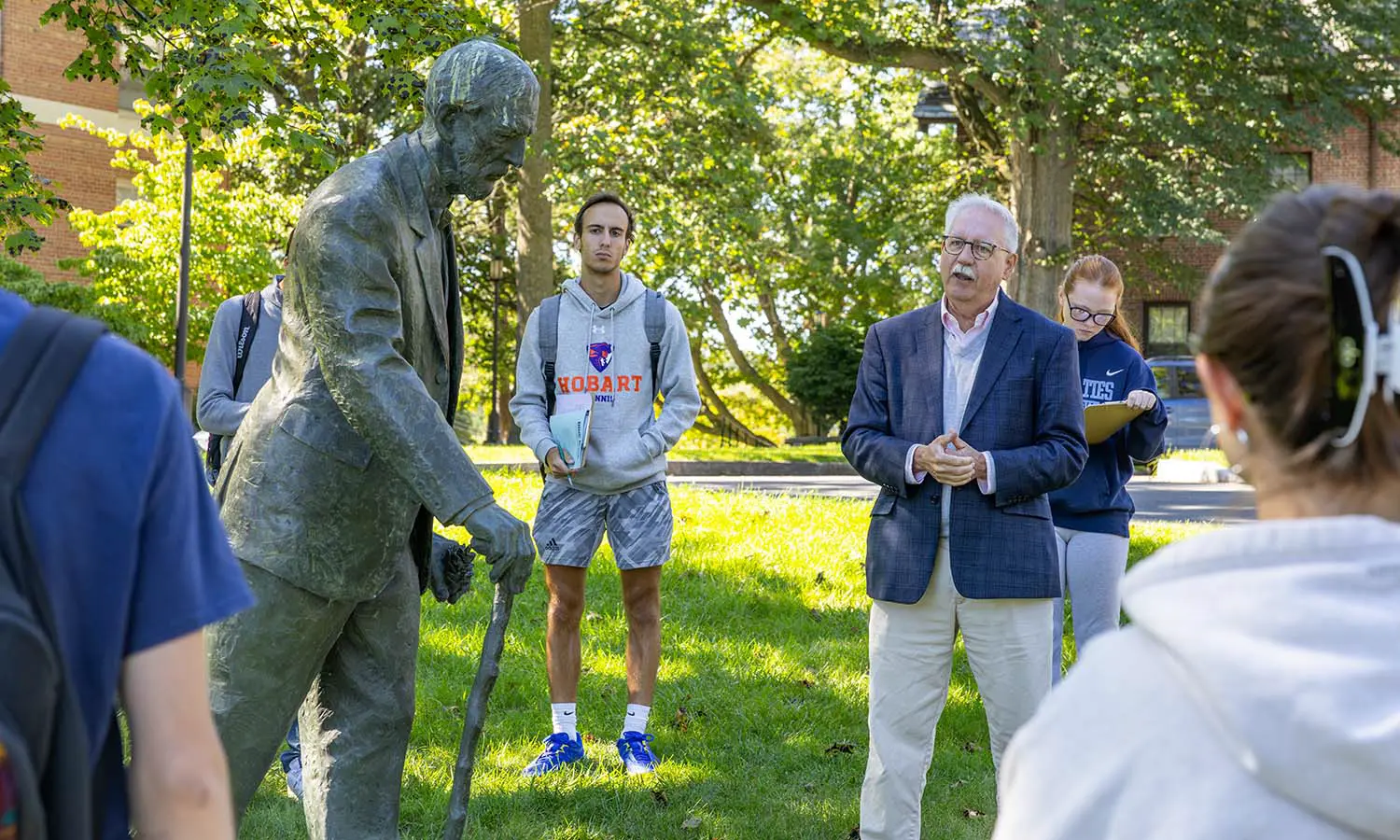 Associate Professor of Art and Architecture Michael Tinkler’s class visits the statue of William Smith created by Professor Emeritus of Art and Architecture Ted Aub.