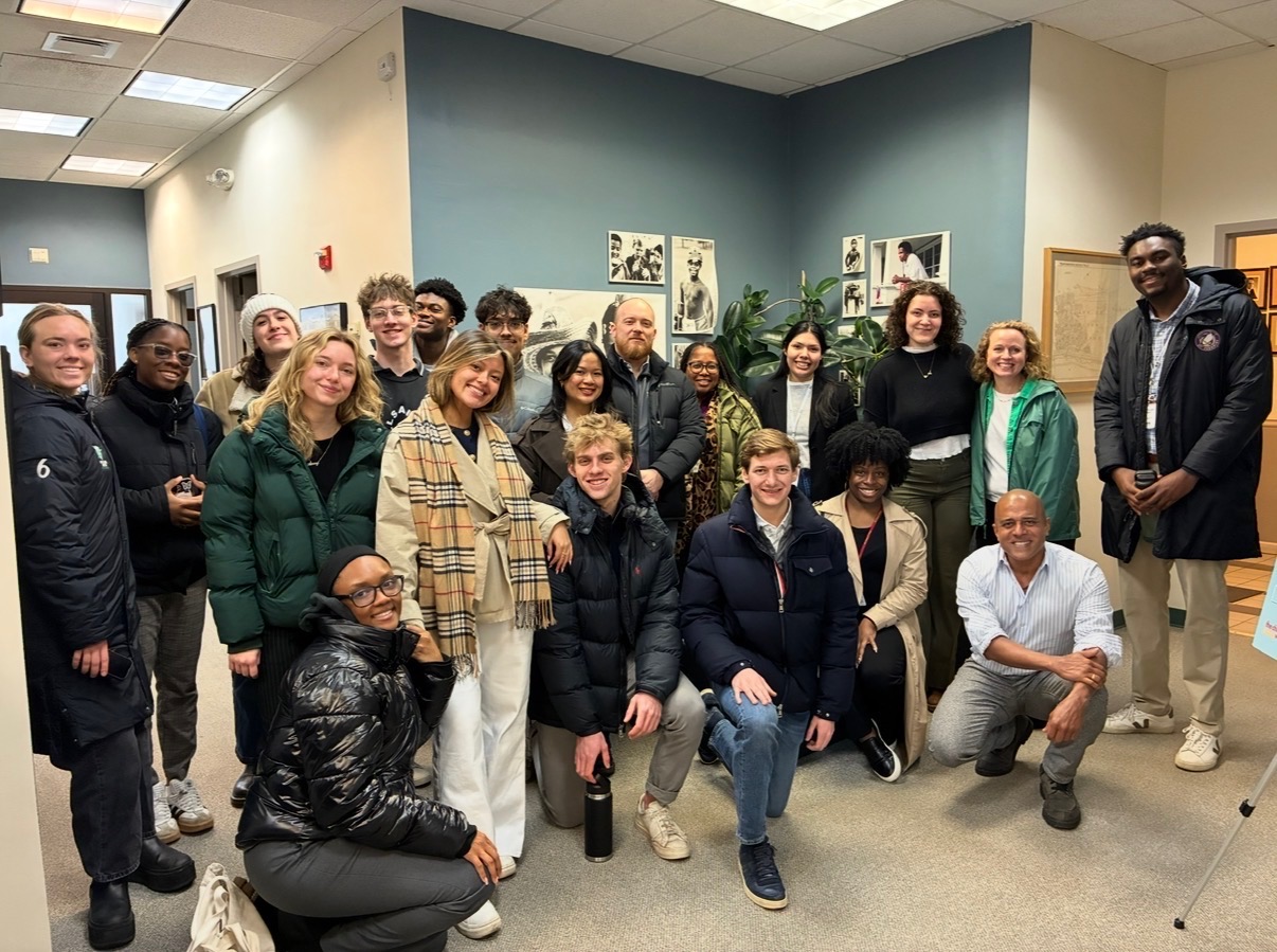 Students gather for a photo with staff.