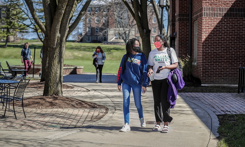 Students walk to class between Coxe and Gulick Halls
