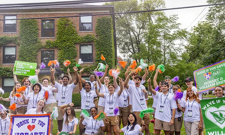 Current students welcome new students to campus.