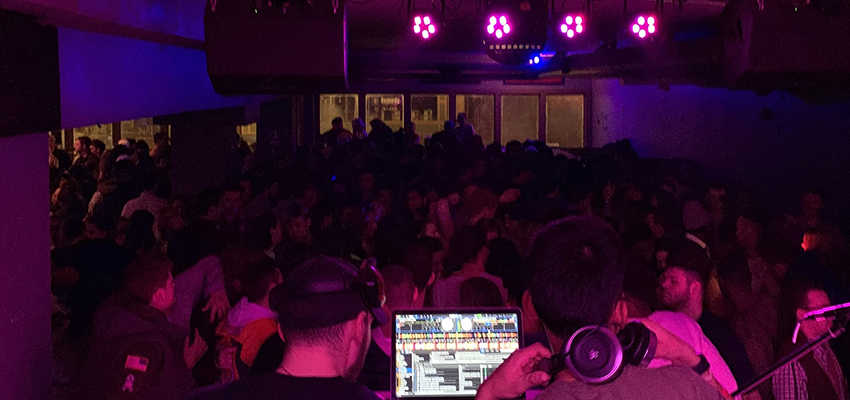 Dhiraj Mukkamala ’20 (bottom, right) DJ’s at FLX Live in 2018.