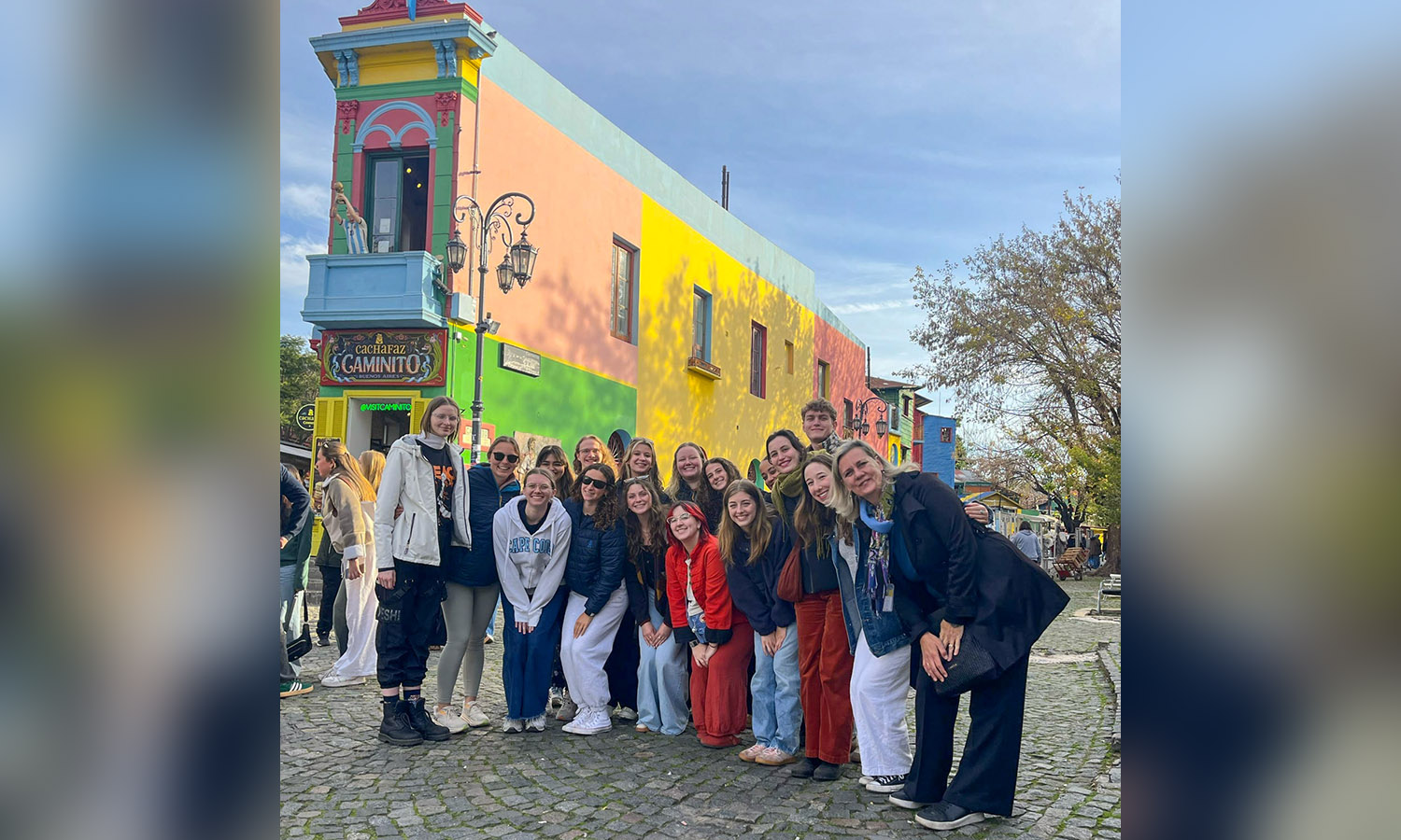 Students pose for a group photo in "La Boca."