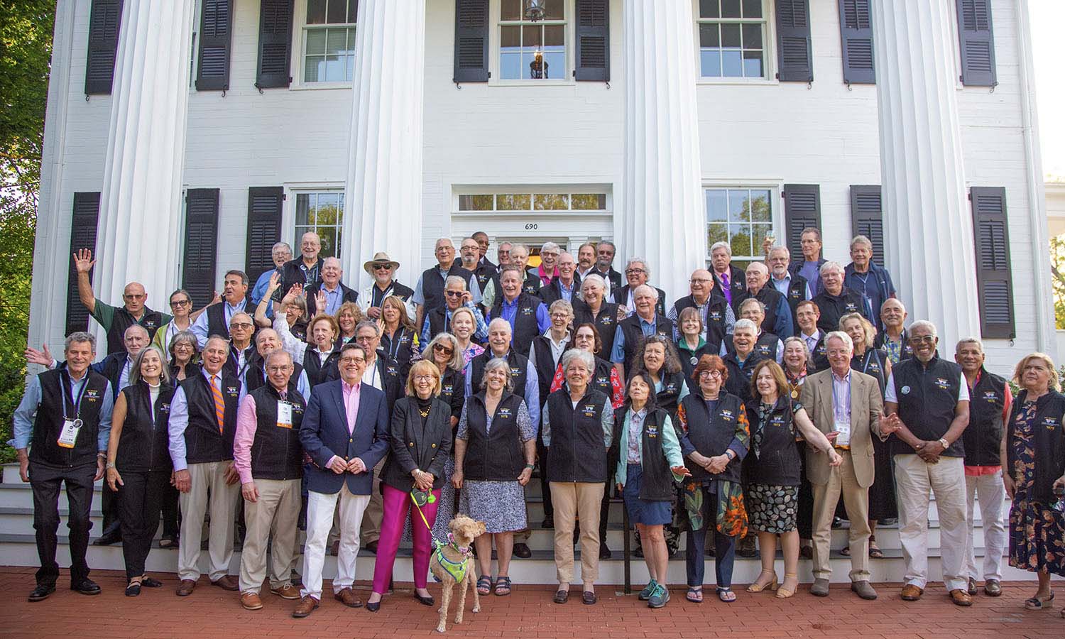 The Class of 1975 gathers for a picture at the President's House. 