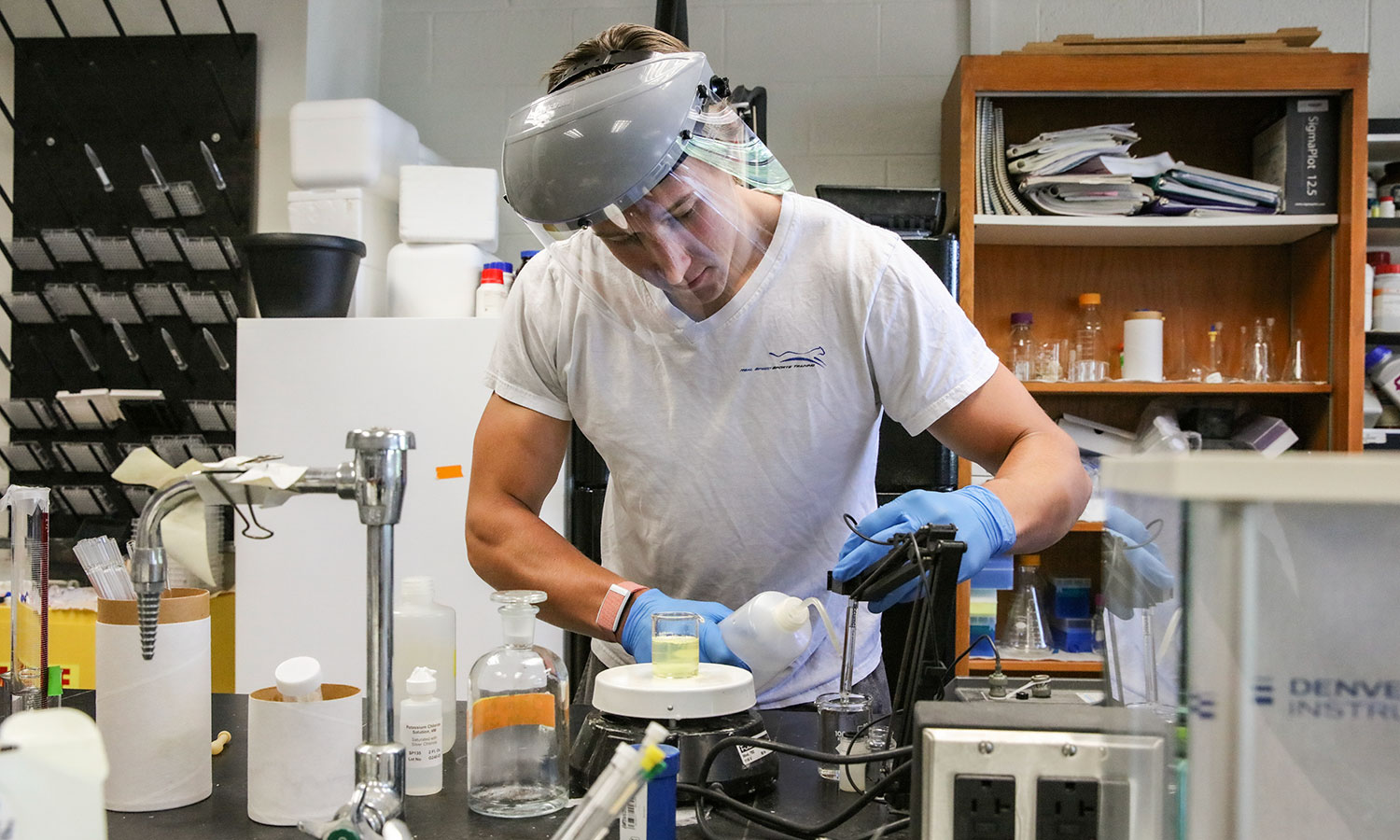 In the lab of Professor of Chemistry Kristin Slade, Alec Robitaille '21 worked on creating more cell-like conditions for enzymes than just a buffer in 2020.