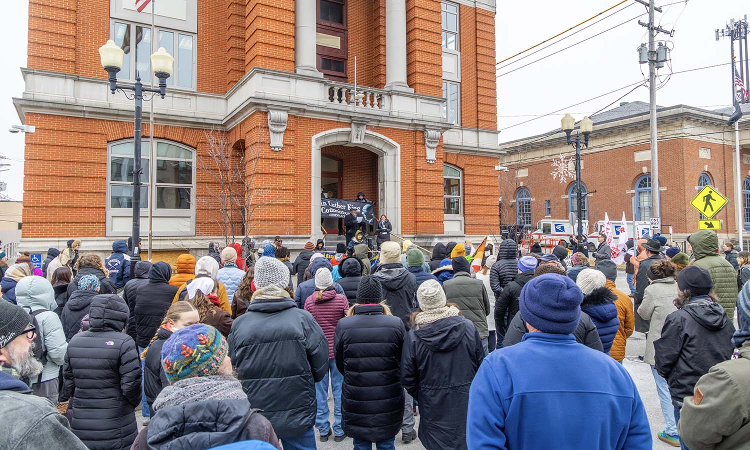 The Rev. Donald Golden, president of the Geneva MLK Committee, delivers a speech at City Hall. 