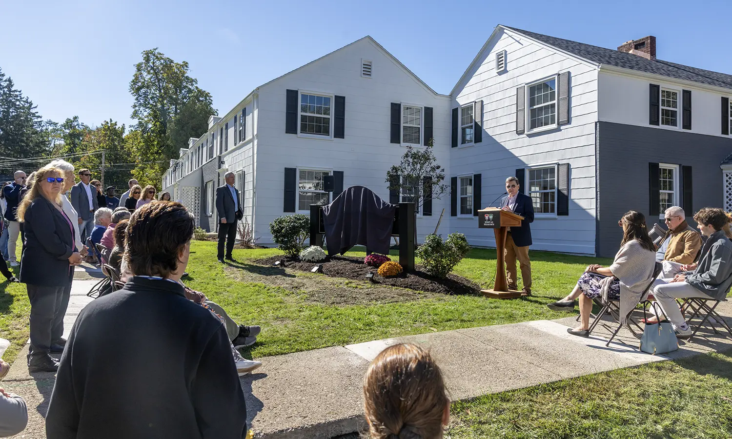 President Mark Gearan welcomes guests to the Piltch Family Commons dedication ceremony, held outside the newly renovated student apartments.