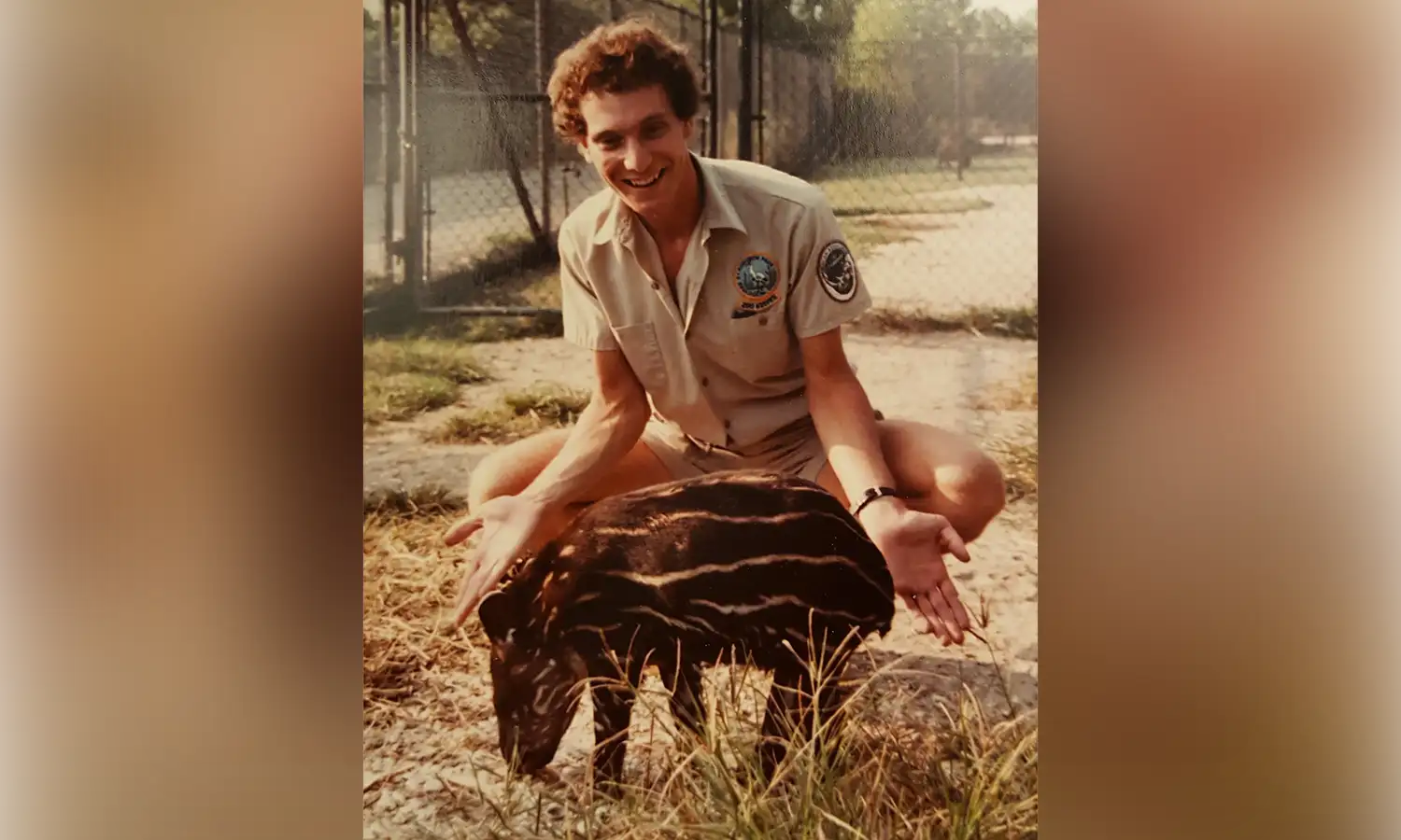 Frank Kohn with an infant South American tapir.