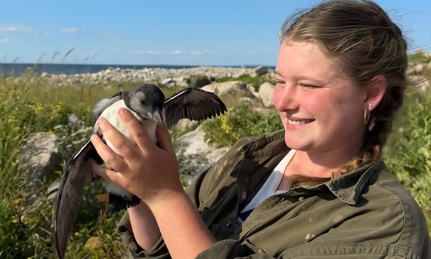 Liz Walker holding a seabird