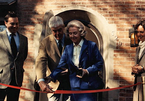 Mr. and Mrs. James Bampton cut the ribbon while President and Mrs. Carroll Brewster look on, 1986.
